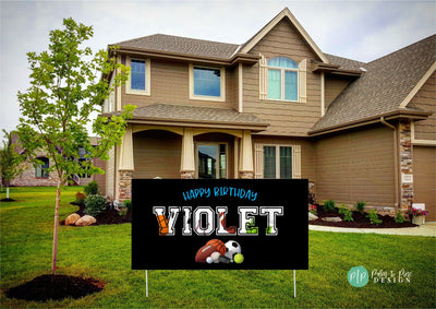 Vibrant sports birthday banner in front yard featuring bold colors and sports graphics with happy birthday text for a sporty celebration.