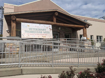 Veterinary Technician Week Appreciation Banner in front of pet hospital