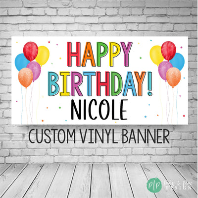 customizable happy birthday banner featuring a name in bold rainbow colors on a white background, decorated with vibrant colorful balloons and scattered confetti for a festive celebration