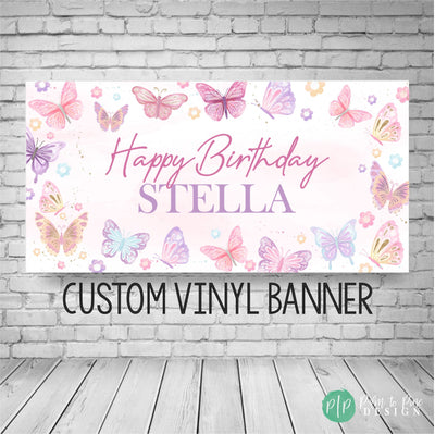 A whimsical butterfly birthday banner in soft pink and purple tones, featuring delicate butterfly designs and elegant lettering. Perfect for a girl&#39;s birthday party.