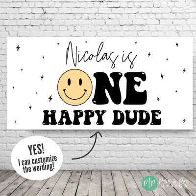 A modern &#39;One Happy Dude&#39; birthday banner featuring a bold design with a yellow smiley face and lightning bolts for a fun and trendy first birthday celebration.