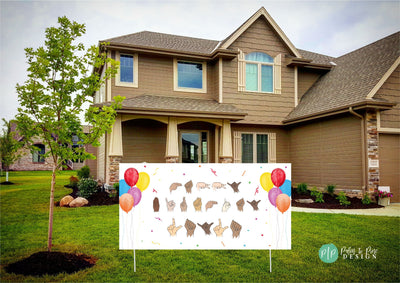 ASL birthday banner in yard