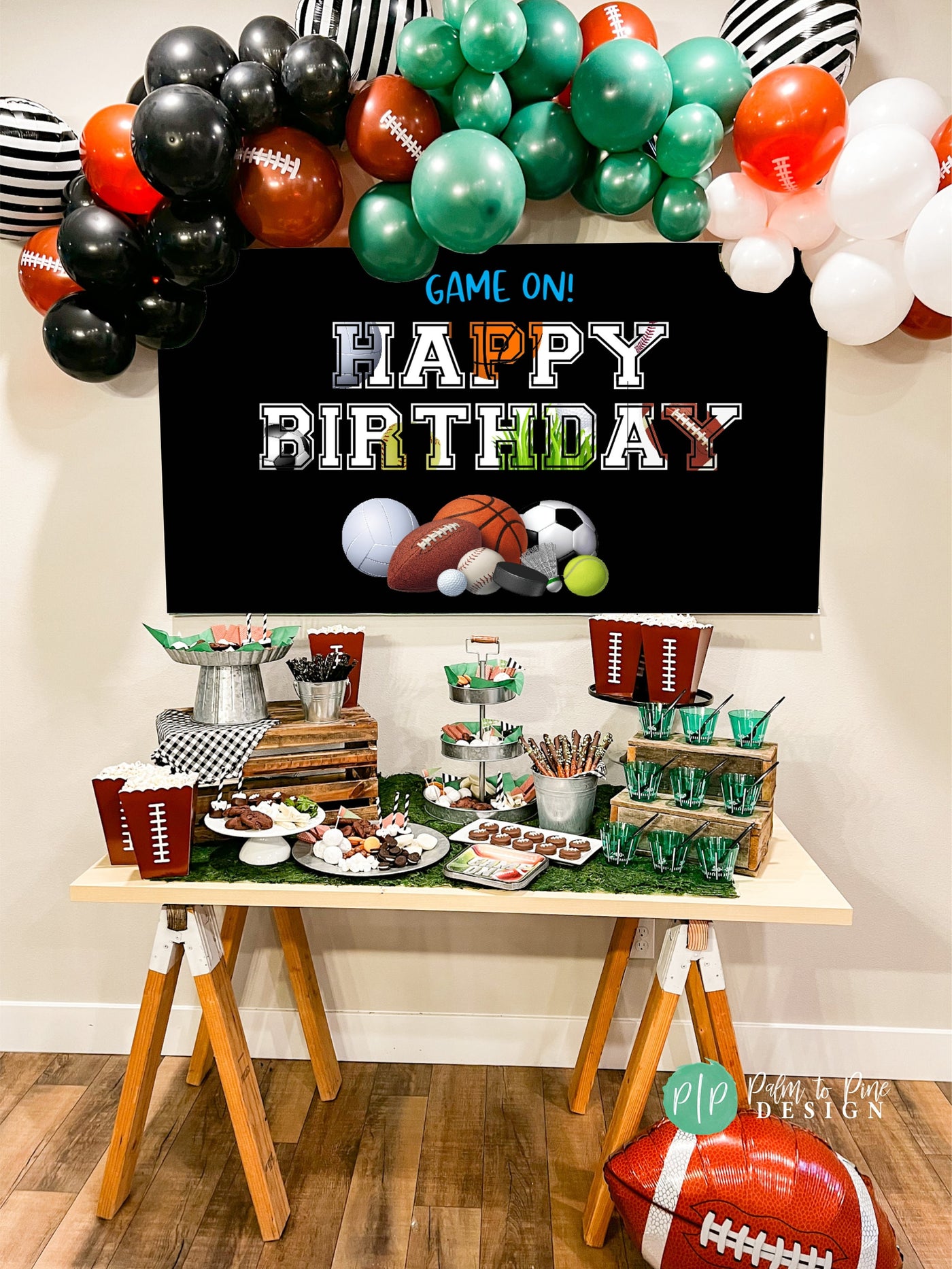 Modern sports party banner with eye-catching designs of basketball, soccer, football, and baseball, at a kids or teens birthday.