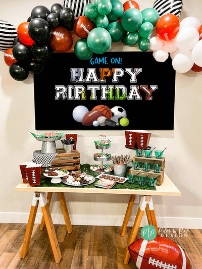 Modern sports party banner with eye-catching designs of basketball, soccer, football, and baseball, at a kids or teens birthday.