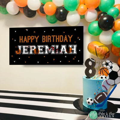 boys basketball birthday banner with balloon garland and sports cake