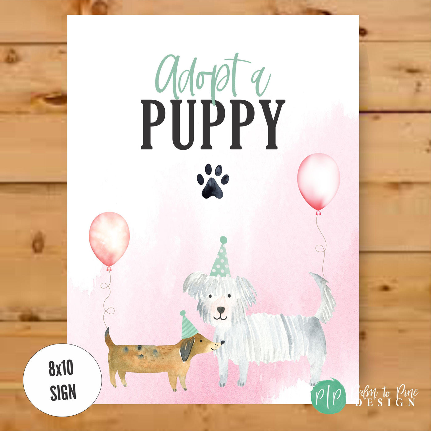 adopt a puppy sign in pink and seafoam green for dog themed birthday party with puppy adoption station party favors