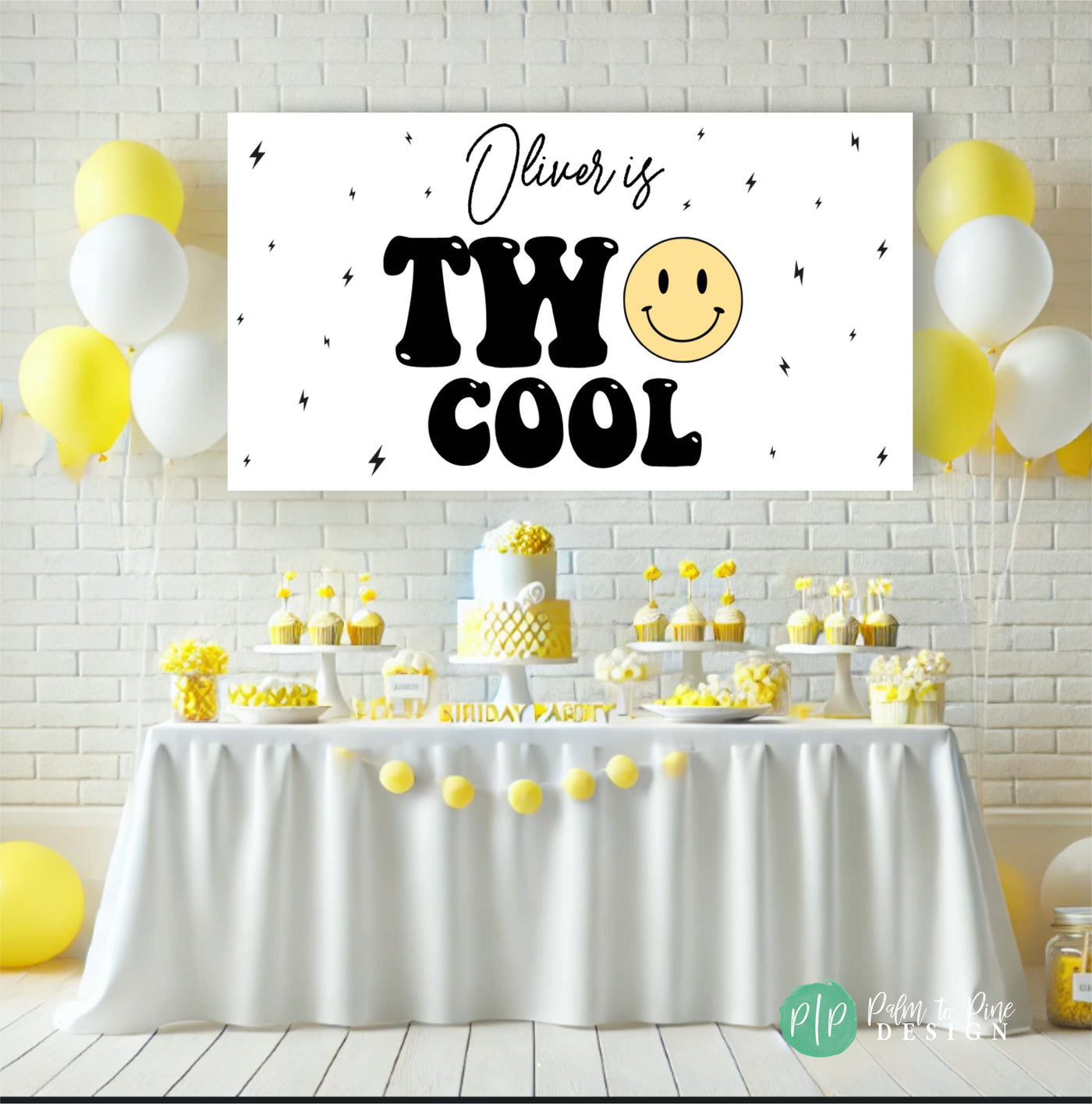 &#39;Two Cool&#39; birthday banner with a minimalist design, showcasing a cheerful smiley face and lightning bolt accents in front of a yellow and white dessert table